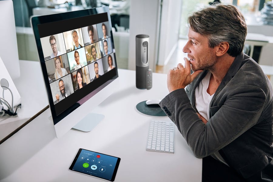 man watching a Zoom meeting