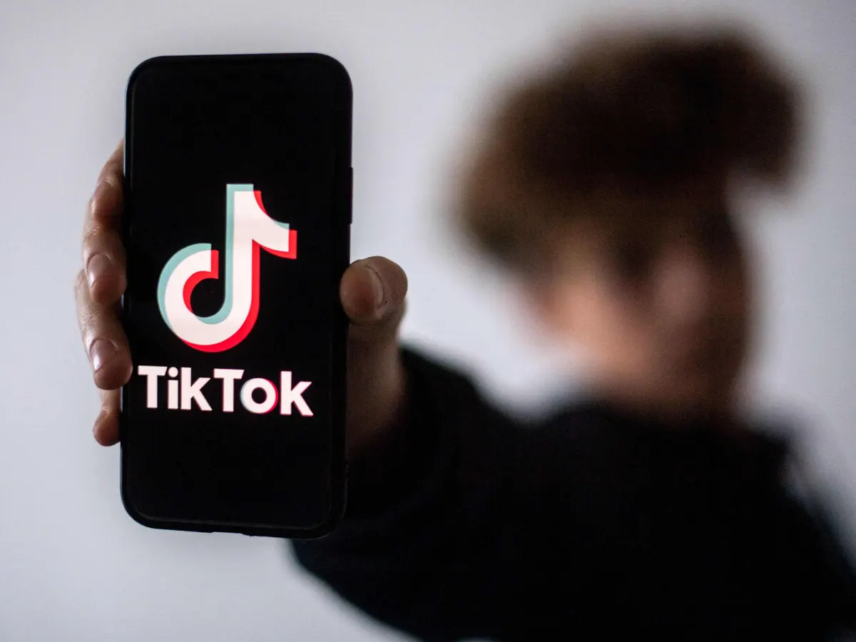 TikTok logo on mobile phone screen